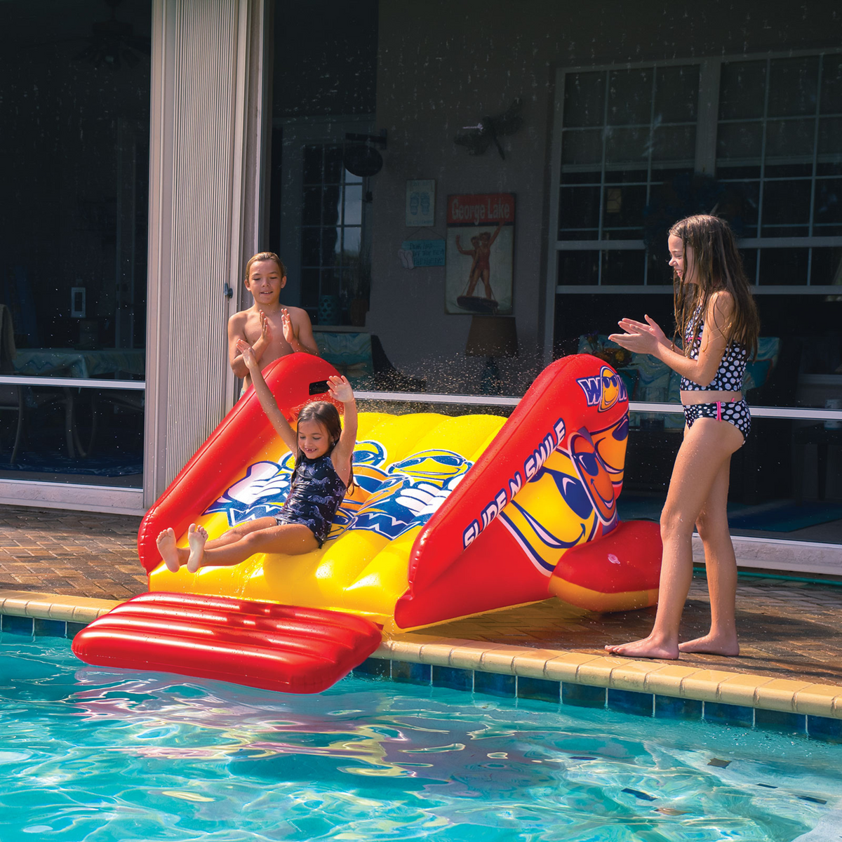 WOW Sports Slide N Smile Inflatable Pool Slide with Sprinklers for Kids and Adults
