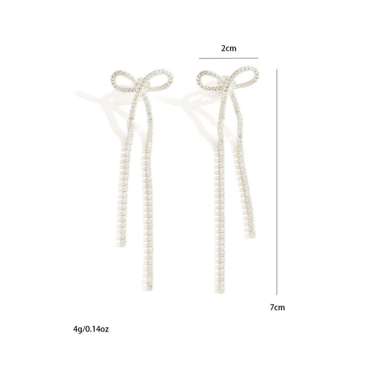 "Women's bridal silver bow rhinestone earrings Women's pendant earrings Chandelier tassel earrings Sparkling crystal earrings Halloween long pendant earrings"