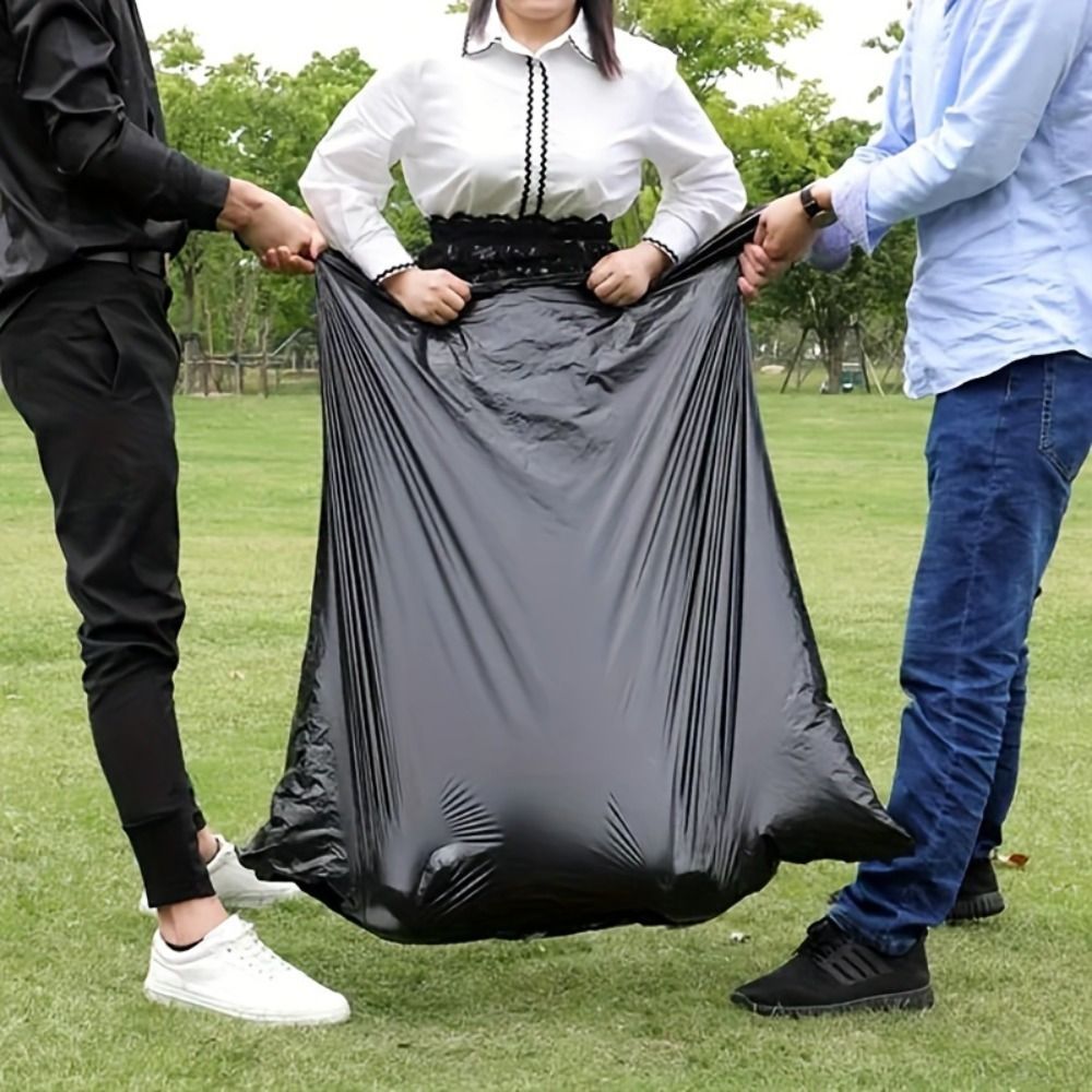 Multiple large heavy-duty tank liners - black plastic garbage bags for lawns, leaves, contractors, yards, and outdoor use